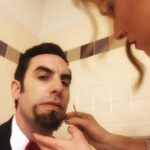 Sacha Baron Cohen Instagram – de #Oscars dem tried to ban me – props to dis honey for getting me ready in secret in de disablist bogs #GrimsbyMovie