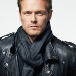 Sam Heughan Instagram - Warming up to Spring…. with @sassenachspirits ☀️🌧️ (Our 100% wool, Scottish artisan hybrid weave scarves are back in stock!) #Sassenach #Tartan