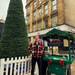 Sam Heughan Instagram - Blustery day in Glasgow!☔️ So heart warming to see the good people of @social_bite out in the wind and rain, raising support to help end homelessness. You too can support and give homeless people a warmer holiday season! 🎄❤️ Link in stories!x