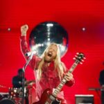 Sam Ryder Instagram - #ad | Vodafone have always had absolute bangers soundtracking their adverts, so obviously I was stoked when they asked me to sing my head off for their latest campaign 🎤 What a blast, red ain’t usually my colour…but that jumpsuit! 😍 Keep your eyes peeled to see this on your TV screens from today 👀 PEACE LOVE YA BYE