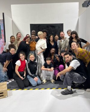 Selma Blair Instagram - I thought my time to ever grace a Vogue cover again was over but while I was in the business of listening, changing and becoming, the people I admire most dreamed a bit of magic for the cover of @britishvogue 

Being in London, working alongside the most thoughtful innovators was one of the finest times of my life. Thank you to @edward_enninful, a guardian, within his pages, of those who are othered. It’s an honor to be chosen by you to represent. I adore you. Thank you to @thesineadburke, a force in and of fashion and knowledge.  A mentor to me whose humor and wisdom, grace and passion for leveling playing fields has transformed my own way of seeing and being.  Thank you to @frances.ryan85 , who so thoughtfully wrote this cover story and in the process, taught me that it is entirely possible to connect within our own disconnected hours. It was a comfort and a privilege to communicate fluidly in unconventional ways.

This is an important day for our community. All of us who have dared to show up and celebrate each other unabashedly and handsomely.👏🏻💛

Image Descriptions:

Image 1: Image shows Selma Blair, a white woman with short blonde hair, on the cover of British Vogue. She is standing against a beige background with her face tilted slightly to the right. In her right hand, she holds a black cane with a silver top. She is wearing a long nude dress by Valentino with cut-outs at the waist and a floor-length cape. The look is complete with matching pointed shoes, also by Valentino. Behind her head, a white Vogue logo in big letters. The cover also reads ‘Reframing Fashion: Dynamic, Daring & Disabled.’]

Image 2: Selma stands wearing a black dress with her black cane in her right hand.

Image 3: Selma stands in the middle in a long white dress on the set surrounded by the creative team.