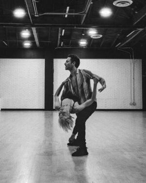 Selma Blair Instagram - Oh the places I’ve been! But I never considered I would be in a dance rehearsal space for a live @disneyplus ballroom dance show. And I loved every single second of it. Having an “atta girl” from so many people in my life and on here and in the @dancingwiththestars 🪩 world has changed me for the better. 
And always to @sashafarber1 for being my first and only partner. 
All love. 💜

thank you @arttavee for always holding me in frame as well. I love you 📷

Series of images of Selma and Sasha in both color and black and white in a dance studio. Selma has short blonde hair and is wearing a black bodysuit. Sasha has short dark hair and is wearing a striped shirt in some images and no shirt in others. Selma’s dog Scout is in the third image on the right in the photo.