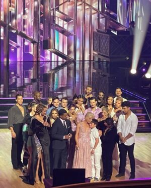 Selma Blair Instagram - My final waltz. Girlhood dreams realized. And making new friends in all of you is my honor. And I hold you all dear. Forever. From the first week to the last.♥️ @dancingwiththestars @disneyplus 

Image one: Selma has short blonde hair and is wearing a long pink dress while holding a cane in her left hand and being lifted and held in the air. 

Image two: Selma and Sasha are dancing on stage while Selma’s pink dress twirls.

Image three: Jessie James Decker has long brown hair and is smiling while standing behind Selma to her left.

Image four: Gabby Whitney has long brown hair and is smiling while standing next Selma to her left.

Image five: Selma stands on the left with her arm around Joseph Baena whole is smiling and wearing a white tank top.

Image six: Jordin Sparks is on the left wearing a white dress and smiling. Emma Slater, standing in the middle, has long blonde hair and is smiling. Selma is standing on the right smiling.

Image seven: Carrie Ann Inaba stands on stage on the left with her hair up and parted in the middle while Selma is on the right.

Image eight: Arthur is a standing on the left in a white shirt and has short brown hair. Ruby Rose also has short brown hair and is standing in the middle with her arms around Arthur and Selma.

Image nine: Selma has slicked back short blonde hair and is standing on the left in a pink dress. Shangela is on the right wearing a purple dress with her short dark hair styled with waves. 

Image ten: Photo of the cast on stage taken from balcony. Selma stands in the middle wearing a long pink dress.