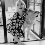 Selma Blair Instagram - NYC. Friday night. Room service. 💛 Image Descriptions: 1) Selma with short blonde hair wearing a black and white floral PJ set, standing in a hotel bathroom and posing for the camera. 2) Selma standing on the bed with one leg up and both arms up. 3) Selma sitting on the bed and looking at the camera. 4) Selma midair with her legs crossed and hands up, looking to the side. 5) black and white photo of Selma kneeling next to Scout and smiling at the camera as he licks her face.