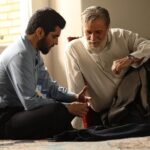 Sina Mehrad Instagram - …سلام آقا شرمنده که دیر مینویسم … اینترنت نداشتیم آقا جون خیلی دلم برات تنگ شده این روزا هم جات خالیه ، هم خالی نیست هم پریشونم که نیستی ، هم خوشحالم که نیستی خوشحالم که نیستی ببینی ، حال دختراتو ، پسراتو ، شاگرداتو … امروز بیش از هر چیزی نیاز دارم به وجودت ، به سایه ات ، به بزرگیت ، به پدریت ، به معلم بودنت .. آقا شما بعد از پدرِ خودم ، یک سال برام پدری کردی ، سریال آقازاده ، یادته ؟ با حرفات ، راهنماییهات ، دلسوزیات … یادمه بعد از اتفاقِ وحشتناکِ هواپیمای اکراینی ، شب کار بودیم ، اومدم سر صحنه ، بغلت کردم ، گریه کردم …حال خودت از همه ی ما بدتر بود ولی بازم مثل یک پدر ،مثل یک معلم ، دلداری دادی ، آروممون کردی … آقاجون ، دوست دارم دوباره من حامد باشم ، شما حاج رضا … من پسر ، شما پدر …من حامدِ بچه مسلمون ، شما حاج رضا , مسلمونِ واقعی حامدی باشم که بخشید ، ازدواج کرد ، ادامه داد ، با دختری که همه کار کرده بود ، دختری که طعمه بود ، دختری که به نیت دشمنی اومده بود ،اصلا به قول اینا خراب بود … ولی حامد پسرِ حاج رضا ، با اون دختر ازدواج کرد ، ادامه داد ، ازش محافظت کرد ، بهش احترام گذاشت ، چون ناموسش بود ، ناموسِ مملکتش بود ، چون حامد ناموس پرست بود… نه مثل بچه مذهبی که ادعای مسلمونی میکنه ولی دخترای پاکِ این سرزمینو میزنه ، با حرص میزنه ، با تمام زورش میزنه ، میزنه که بمیره … حاج رضا کاش بودی و ادامه میدادی ، به معلمی ، به پدری ، که بازم مثل حامد تربیت کنی ، راهنمایی کنی ، دستی رو سرمون بکشی ، پشت و پناهمون باشی ، هم برای اون دختر ، هم برای حامد … آقا ، حاج رضا ، استاد تارخ بدرود و به امید دیدار دوستت دارم ❤️😔 @tarokh.amin