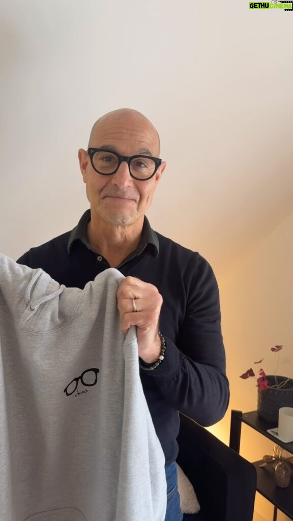 Stanley Tucci Instagram - Together we raised a huge £60,000 for @warchilduk so we’ve decided to extend our War Child X Stanley Tucci collection to some nifty hoodies and beanies. Hoodies come in black, grey, pink and white. Beanies come in black. The money we raise together really does make a difference. Link in my bio to buy yours!