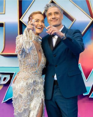 Taika Waititi Instagram - Thor: Love and photo dump. Fabulous London premiere with beloved family, close friends, and Jason Momoa 😘. Seriously great night and even greater relief to finally see this film releasing in theaters tomorrow. Just like @chrishemsworth and his arse, I put a lot of work into this film and can't wait for you all to see it. July 8 baby!#thorloveandthunder @marvelstudios 
Please let's also try and zoom in on that emerald by @cartier 
Styluz: @jeanneyangstyle 
Fabrik: @prada 
💎: @cartier 
Photos: tag yourselves. I dunno how to find you but I appreciate you.