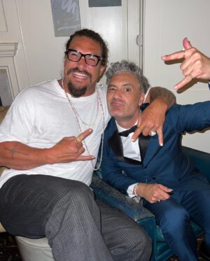 Taika Waititi Instagram - Thor: Love and photo dump. Fabulous London premiere with beloved family, close friends, and Jason Momoa 😘. Seriously great night and even greater relief to finally see this film releasing in theaters tomorrow. Just like @chrishemsworth and his arse, I put a lot of work into this film and can't wait for you all to see it. July 8 baby!#thorloveandthunder @marvelstudios 
Please let's also try and zoom in on that emerald by @cartier 
Styluz: @jeanneyangstyle 
Fabrik: @prada 
💎: @cartier 
Photos: tag yourselves. I dunno how to find you but I appreciate you.
