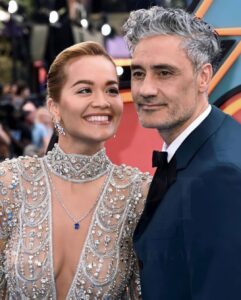 Taika Waititi Instagram - Thor: Love and photo dump. Fabulous London premiere with beloved family, close friends, and Jason Momoa 😘. Seriously great night and even greater relief to finally see this film releasing in theaters tomorrow. Just like @chrishemsworth and his arse, I put a lot of work into this film and can't wait for you all to see it. July 8 baby!#thorloveandthunder @marvelstudios Please let's also try and zoom in on that emerald by @cartier Styluz: @jeanneyangstyle Fabrik: @prada 💎: @cartier Photos: tag yourselves. I dunno how to find you but I appreciate you.