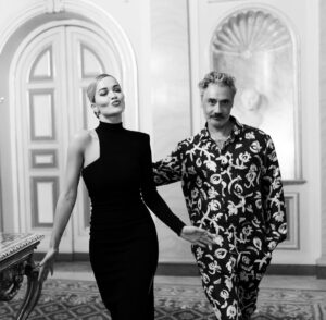 Taika Waititi Instagram - Followed this chick around Madrid while she sang in a palace for @cartier. Thank you, Universe, for this sweet life and also thank you @nanushka for the silkies. damn your clothes are nice. 
Stylez: @jeanneyangstyle 
📸: @tiziano.raw