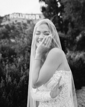 Taika Waititi Instagram - Happy anniversary, @RitaOra and @TaikaWaititi! To celebrate their special day, the couple has shared their never-before-seen wedding album with Vogue.

Over the past year, information about their nuptials has spread like wildfire across the internet—not all of it correct. “It’s actually been quite entertaining for us to see the different stories people made up and all the while getting to keep it to ourselves,” Rita admits. “And, I love that we now get to share what really happened—and to do it on our one year anniversary no less!”

“Rita [Ora] proposed to me, and I said ‘yes’ instantly,” filmmaker Taika Waititi says of how he and the singer-songwriter became engaged. While the pair first met at a barbecue in 2018 that Taika hosted at his house in L.A., it wasn’t until 2021, when they were both filming in Australia, that they began dating. Rita popped the question while on vacation in Palm Springs in the summer of 2022, and they planned an impromptu wedding to be held in Los Angeles a few weeks later, on August 4. “It wasn’t in London or in France like everyone reported,” Taika clarifies. “It was in L.A. with a small group of friends.”

See all the photos from their big day at the link in our bio. Photo: @jackgorlin