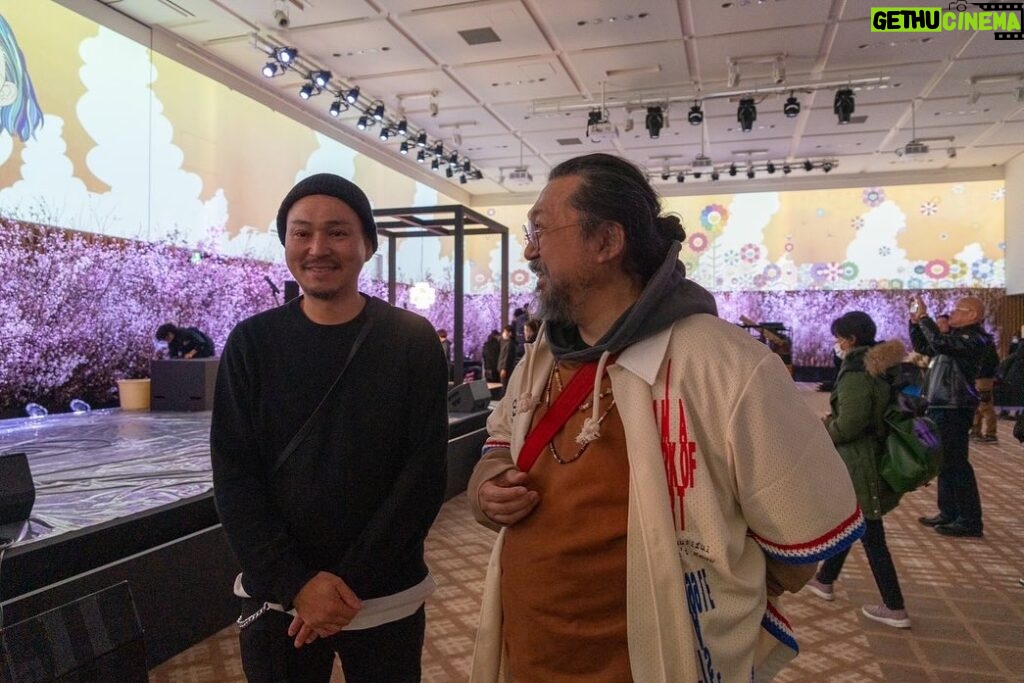Takashi Murakami Instagram - On February 2, from 8 to 10 pm, a dinner party was held for my “Takashi Murakami: Mononoke Kyoto” exhibition, where about 5,000 cherry blossoms were in full bloom (80% of the flowers in bloom!) at once. Floral artist Makoto Azuma (AMKK) is the one who pulled off this tremendous feat. Makoto Azuma is a floral artist who has been creating flower arrangements in outer space, executing a large floral installation deep under the sea, arranging flowers in a frigid world of absolute zero, and growing plants in a kind of perpetually circulating nature device invented by humans long ago. He is an artist with a concept of symbiosis between humans and plants, who works with flower as his theme. Twenty years ago, when I received flowers from Mr. Koichi Inaba, the president of the management company of the folk duo, Yuzu, I was very much impressed; they were arranged by Mr. Azuma. Later, I saw Mr. Azuma in a TV documentary, sobbing and stomping in frustration. Intrigued by this very unusual person, I went to visit him at his studio in an old house in Azabu. I really wished to organize a dinner with cherry blossoms as the theme, so I approached Mr. Azuma around mid-December last year. He kindly and readily agreed and immediately got to work: He cut 5,000 Cherry branches, put them in a greenhouse, closely managed the temperature, and on February 2, the very day of the dinner, he made the cherry blossoms bloom at the optimal 80%. I guess he is what you would rightfully call a genius. He really realized an installation of cherry blossoms in full bloom, filling the venue with the smell of beautifully cut flowers, which left us gaping in awe. My sincerest gratitude, Mr. Azuma. @amkk_project @jardins.des.fleurs @azumamakoto @takashimurakami_mononoke_kyoto by #azumamakoto #amkk #amkkproject #shiinokishunsuke #naritaeri #cherryblossom #kyotocitykyoceramuseumofart #kyoto #art #TakashiMurakami #mononokekyoto