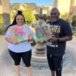 Tamela Mann Instagram - Good morning from paradise ❤️ Who’s painting would you choose?👀😂 Leave a 🤎 for David’s Leave a 💞 for Tams #35years #themanns