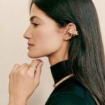 Tara Emad Instagram - Friend of the Maison Tara Emad dares to pair the spiked studs of the #ClashdeCartier with the fluid bands of the #CartierTrinity.