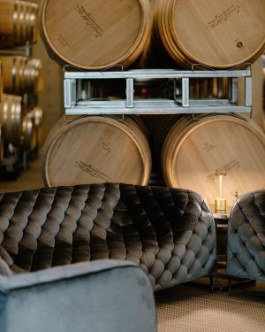 Taylor Lautner Instagram - WELCOME PARTY
Following rehearsal dinner, doors opened to the rest of the underground wine caves where we held a party to welcome all of our guests to Paso Robles for the weekend. Two black wooden bars, grey stoneware plates, charcoal tufted couches and loveseats, and gorgeous concrete and wooden starburst cocktail tables were additional details which enhanced the existing environment, and played into the underground winery aesthetic. We are true foodies at heart so we wanted to give guests an assortment of options to indulge in. This included 4 different food stations to satisfy every palate. A Mezze station, oyster and seafood bar, Tapas station and an Americana station. Our personal favorite was the chef carved Jamoń Iberico and chef manned raclette cheese melter. Complimenting the delicious food of course was Epoch’s killer wines. It truly was the most unique environment and best way to welcome all of our family and friends to a place that holds such a special spot in our hearts. 
Let the festivities begin! 

Planning and Event Design @samkoma.world 
Venue @epochwines 
Photography @nicoleivanovphoto 
Lighting @tn_event_designs