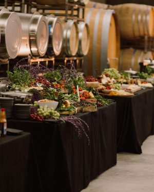 Taylor Lautner Instagram - WELCOME PARTY
Following rehearsal dinner, doors opened to the rest of the underground wine caves where we held a party to welcome all of our guests to Paso Robles for the weekend. Two black wooden bars, grey stoneware plates, charcoal tufted couches and loveseats, and gorgeous concrete and wooden starburst cocktail tables were additional details which enhanced the existing environment, and played into the underground winery aesthetic. We are true foodies at heart so we wanted to give guests an assortment of options to indulge in. This included 4 different food stations to satisfy every palate. A Mezze station, oyster and seafood bar, Tapas station and an Americana station. Our personal favorite was the chef carved Jamoń Iberico and chef manned raclette cheese melter. Complimenting the delicious food of course was Epoch’s killer wines. It truly was the most unique environment and best way to welcome all of our family and friends to a place that holds such a special spot in our hearts. 
Let the festivities begin! 

Planning and Event Design @samkoma.world 
Venue @epochwines 
Photography @nicoleivanovphoto 
Lighting @tn_event_designs