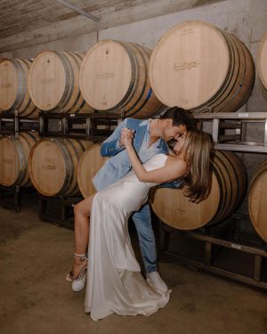 Taylor Lautner Instagram - WELCOME PARTY
Following rehearsal dinner, doors opened to the rest of the underground wine caves where we held a party to welcome all of our guests to Paso Robles for the weekend. Two black wooden bars, grey stoneware plates, charcoal tufted couches and loveseats, and gorgeous concrete and wooden starburst cocktail tables were additional details which enhanced the existing environment, and played into the underground winery aesthetic. We are true foodies at heart so we wanted to give guests an assortment of options to indulge in. This included 4 different food stations to satisfy every palate. A Mezze station, oyster and seafood bar, Tapas station and an Americana station. Our personal favorite was the chef carved Jamoń Iberico and chef manned raclette cheese melter. Complimenting the delicious food of course was Epoch’s killer wines. It truly was the most unique environment and best way to welcome all of our family and friends to a place that holds such a special spot in our hearts. 
Let the festivities begin! 

Planning and Event Design @samkoma.world 
Venue @epochwines 
Photography @nicoleivanovphoto 
Lighting @tn_event_designs