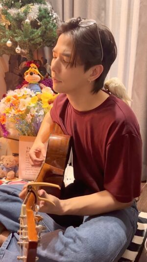 Thanat Lowkhunsombat Instagram - UNTIL I FOUND YOU 🎄🦜 #leeandhisguitars