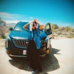 Thuso Mbedu Instagram - I’ve been driving the Cadillac XT4 for a couple of weeks and it’s been tons of fun. (My favorite thing to do when trying to see how a car handles is drive it up and down Sepulveda - between Ventura and just after the Getty Center… or on Mulholland🤪) Anywho! I got to take this baby to Coachella and what I absolutely loved was that it’s such a light drive I legit forgot that I was driving an SUV (it’s the smallest SUV in the Cadillac fleet). Normally when driving long distance in a big car I feel like I’m getting an arm workout and who wants that 😭 but this was an amazing drive. Thanks @cadillac 👏🏾🫶🏾