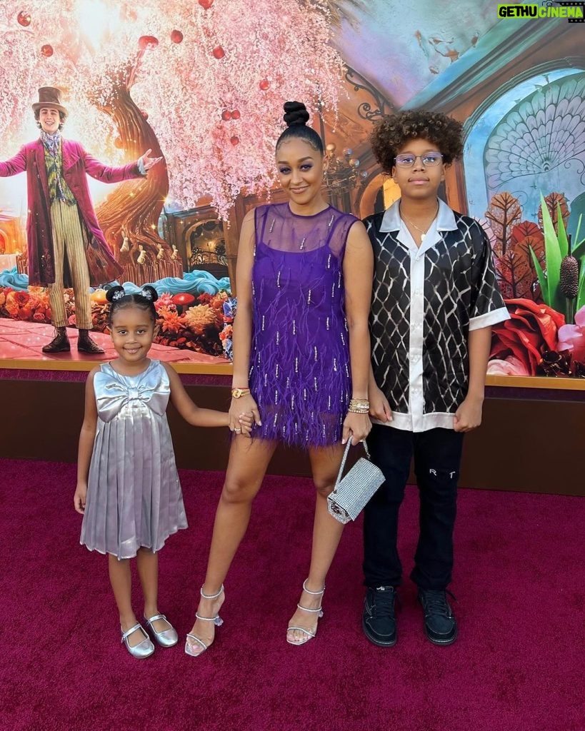 Tia Mowry Instagram - We got the golden ticket 🎟️ The @wonkamovie premiere was so much fun, and the kids loved the whimsical world of Willy Wonka! I grew up watching this movie and being so enthralled with the larger than life personality of Wonka, so I was really excited to see another take on the classic and be able to experience it with Cree and Cairo 🍫 I feel so blessed to be able to have these amazing experiences with my kids, and give them these cool opportunities! These moments with my kids are the memories I’ll always cherish 💕