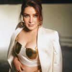 Tisca Chopra Instagram - The incredible @tiscaofficial in custom MISHO couture 💣 Tisca dazzles in the Sira body piece in Ivory, custom silk trousers and a blazer paired with some of our fav MISHO jewels, the Chunky Chain hoops and stacked up cuffs. I’ve admired her work through the years and it was such a pleasure to create something beautiful for the premier of her new movie Murder Mubarak. Cannot wait to watch the movie out this week :) 📸 @vidhigodha Makeup @cashmakeupartistry Hair @hairbyseema