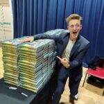 Tom Fletcher Instagram - That’s a lot of books! Thanks to @ourbookshoptring and @rosietellstales for hosting an awesome event for me at @tringschool today, and of course thanks to all the kids for listening to me chat about Christmas in October! They told me @jeffkinney signed this many books in under 30 minutes which sounded like a challenge to me. 😜 Did I break his record?! #thechristmasaurus #christmasaurus #christmas #dinosaurs #books #childrensbooks