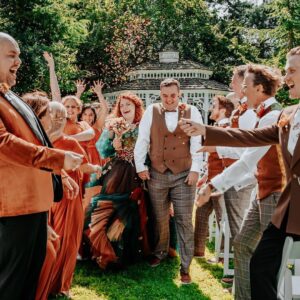 Tom Fletcher Instagram - I’ve not had a chance to properly write about this yet but in the middle of the summer, on the most glorious of summery days, my sister @carriehopefletcher married @joelmontague10. It was a perfect day. I had the terrifying honour of singing (and sobbing) while our three boys walked Carrie down the aisle (with bubble guns 🥴🤣) and the whole day was the most awesome, musical-theatre-sprinkled wedding of autumnal Disney dreams, complete with a SUNG grooms speech…I mean, who even does that @joelmontague10 😜. Anyway, I know a bit of time has gone but I just wanted to say the day was the best and I love you both.