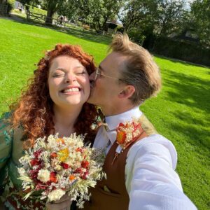 Tom Fletcher Instagram - I’ve not had a chance to properly write about this yet but in the middle of the summer, on the most glorious of summery days, my sister @carriehopefletcher married @joelmontague10. It was a perfect day. I had the terrifying honour of singing (and sobbing) while our three boys walked Carrie down the aisle (with bubble guns 🥴🤣) and the whole day was the most awesome, musical-theatre-sprinkled wedding of autumnal Disney dreams, complete with a SUNG grooms speech…I mean, who even does that @joelmontague10 😜. Anyway, I know a bit of time has gone but I just wanted to say the day was the best and I love you both.