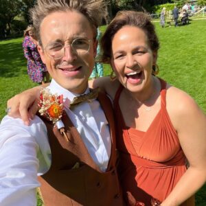 Tom Fletcher Instagram - I’ve not had a chance to properly write about this yet but in the middle of the summer, on the most glorious of summery days, my sister @carriehopefletcher married @joelmontague10. It was a perfect day. I had the terrifying honour of singing (and sobbing) while our three boys walked Carrie down the aisle (with bubble guns 🥴🤣) and the whole day was the most awesome, musical-theatre-sprinkled wedding of autumnal Disney dreams, complete with a SUNG grooms speech…I mean, who even does that @joelmontague10 😜. Anyway, I know a bit of time has gone but I just wanted to say the day was the best and I love you both.