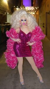 Trixie Mattel Instagram - effie trinket at the 1977 hunger games district 2 reaping