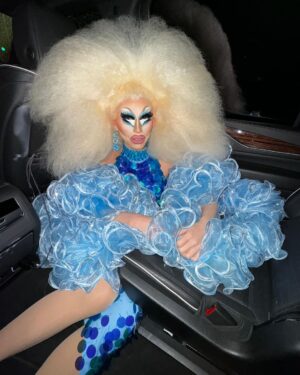 Trixie Mattel Instagram - I need a Flinstones car where I can stick my head out of the top like Dino. 🦕