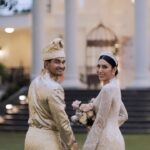 Tyas Mirasih Instagram - Here’s to love and laughter and happily ever after 💍 Well Organized by : @adara.wedding Venue @themanorandara Photography & Videography : @morden.co @samuelrustandy @bychandrasusanto Decoration & Tents : @classytentdecoration Carpets : @farahcarpetsofficial Lighting : @uplightpro Make Up : @hepidavid Hair Do : @tominjoo Bride’s Attire for Akad Nikah & Reception : @svarna_byikatindonesia @didietmaulana Bride’s Crown & Headpiece @rinaldyyunardi Jewelry : @adellejewellery Bride’s Wedding Shoes : @regisbridalshoes Bride’s robe : @lucette_essie Bride’s Nail art : @kookoo.nails Groom’s Attire for Akad Nikah & Reception : @svarna_byikatindonesia @didietmaulana Bride and Groom textile : @the.designerworkshop Groom’s Hairstylist : @aryadillah_27 Makeup Mother of the groom & Sister of the bride : @wulanwidianto Makeup sister of the groom : @bonitaelisabeth.makeup @belovedbyhepidavid Wedding Ring : @adellejewellery Akad Catering : @teppanku @baksobuetu @gococo.indonesia @ponut.id @papo_id @cantikaputricake Reception Catering : @themanor.cafe Akad Souvenir : @howelandco Reception Souvenir : @redribbongift @drzlim_official Digital Invitation & Live streaming : @viding.co Mahar & Ring box : @jingga_seserahanmahar Bouquets : @faveur.florist Wedding Cake : @sweetsalt_id Birthday Cake : @RRCakes Entertainment : @aqisinggih Sound system : @deoentertainmentindonesia MC Akad & Reception : @andrakarna Usher : @beauty_usher Photobooth : @theholograil Gift : @farahcarpetsofficial @bardismarthome #TEZIapbahagiainTYAS