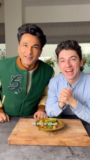 Vikas Khanna Instagram - I’m in the kitchen with @vikaskhannagroup cooking some Chicken Chitranee, a homestyle curry from the kitchens of Baghdadi Jews in Kolkata, India. We served this lemony curry with Shishito Pepper fresh pickle for some spice. This dish will be on the menu at @bungalowny opening March 23! #indianfood #cooking #recipe #chickencurry