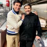 Vikas Khanna Instagram - The second book in BBC (Bungalow Book Club) has to be iconic Indian Home cooking by Suvir. I still remember walking into Barnes & Noble on 5th Avenue & seeing this book on the center table. (August 31, 2004) I had witnessed amazing Indian food writers in America, but @suvirsaran single handedly changed the game & turned everything so personal about Indian cooking. My first self-published book on Ayurveda was dedicated to him in 2005. I’m so honored that during his recent trip to NY, he visited Bungalow’s library & the kitchen. A true friend. A legend. 20 Years of Indian Home Cooking legacy. 19 Days To Go!