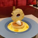 Vikas Khanna Instagram - This dish was inspired from Ugadi in Udupi. (1992) The harvest festival of Karnataka. I had the Prasad of coconut payasa (rice pudding) at Krishna Temple & later went to my sculptor teacher Gangadhar Rao house for the festival prayers. His amazing wife had made Pineapple Sheera for me. The taste of memory helped us create this dish. And here we are recreating 30+ memories through food. ❤️ Kinara by Vikas Khanna @kinaradxb Kinara By Vikas Khanna