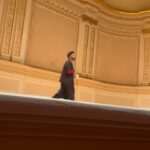 Vikas Khanna Instagram - What a history creating moment today. VIR DAS performed at the iconic Carnegie Hall in NY to a sold out audience. So much energy & brilliance on stage. This is not the first time Vir created history. On Nov 20th, he had won the International Emmy. More power to you brother for making India proud. XX 1. Vir enters the stage at the iconic @carnegiehall 2.3.4. Mesmerized audience 5. Standing applause for @virdas & @zarnagarg for 5 minutes. ❤️🥰 6.7. Backstage 8. Vir announced as a WINNER at Emmy 9. The king arrives & I shot it through Ekta Kapoor’s Emmy 10. Backstage