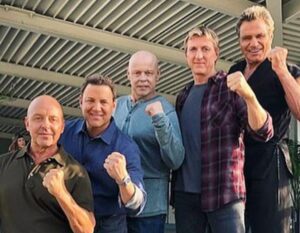 William Zabka Instagram - Yesterday marked one year since we lost our brother & OG #CobraKai Rob (“Tommy”) Garrison. So grateful we had the chance to reunite the characters that brought us together so many years ago. He was extremely proud of this episode —- and like a true Cobra he put his heart into it & left it all on the mat! His legacy will live forever... “Cobra Kai Never Dies”