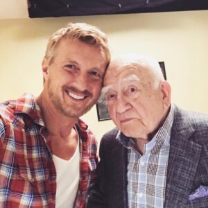 William Zabka Instagram - “Johnny & Sid” behind the scenes Cobra Kai Season One — what an honor to work with the legend Ed Asner