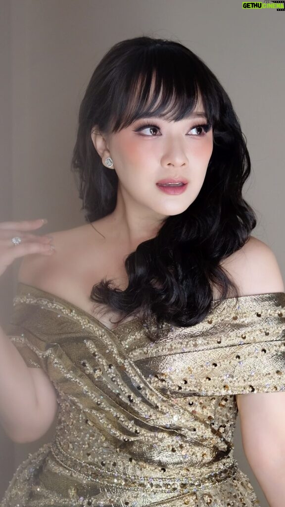 Yuanita Christiani Instagram - In a world where you can be anything, please be kind to one another🫶🏻✨ . Bronze dress @cynthiatan__ Brushed @karenshenna.makeup Hair @hairdo_j