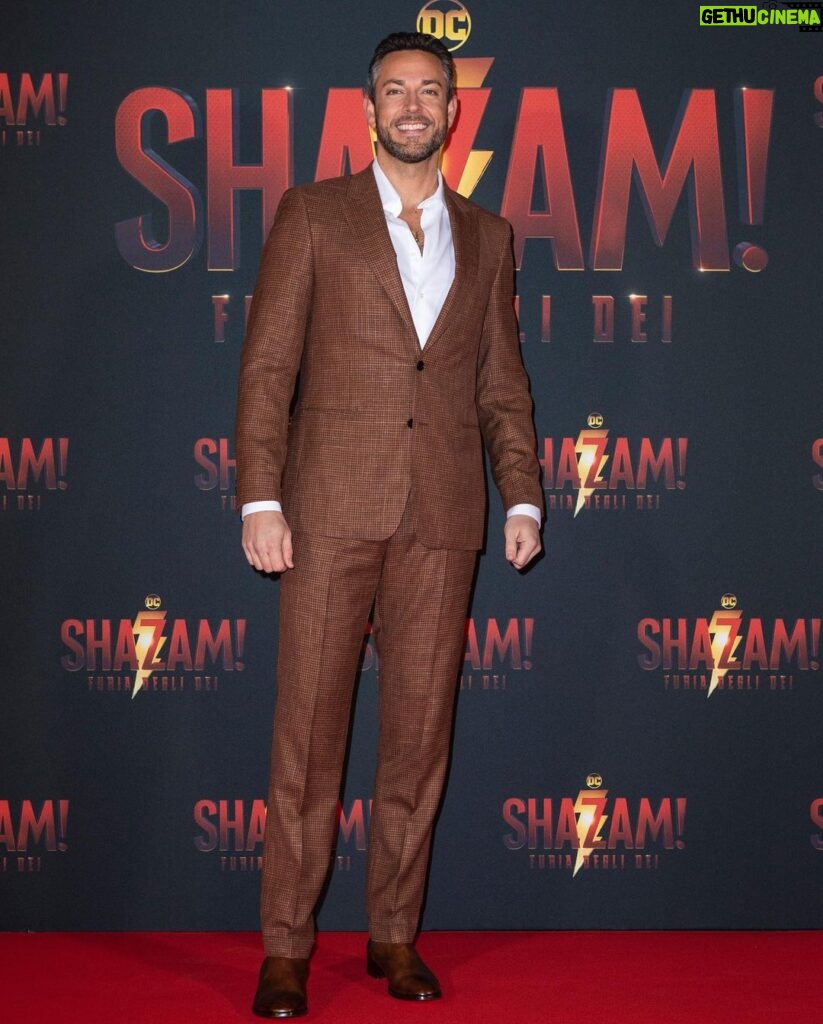 Zachary Levi Instagram - One more for the lewk. 📍🇮🇹 Grooming: @mnmachado Styled by: @warrenalfiebaker Suit: Custom @brooksbrothers Shoes: @louboutinworld Watch: @montblanc Necklace: @movado First photo ©️@marillasicilia/@mondadoriportfolio Photos: @warnerbrosuk @warnerbrosentertainment @shazammovie Rome, Italy