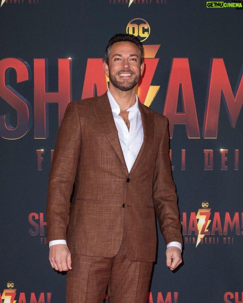 Zachary Levi Instagram - One more for the lewk. 📍🇮🇹 Grooming: @mnmachado Styled by: @warrenalfiebaker Suit: Custom @brooksbrothers Shoes: @louboutinworld Watch: @montblanc Necklace: @movado First photo ©️@marillasicilia/@mondadoriportfolio Photos: @warnerbrosuk @warnerbrosentertainment @shazammovie Rome, Italy