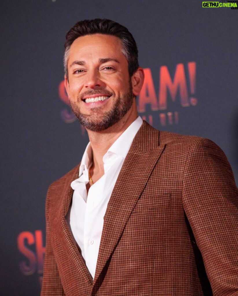 Zachary Levi Instagram - One more for the lewk. 📍🇮🇹 Grooming: @mnmachado Styled by: @warrenalfiebaker Suit: Custom @brooksbrothers Shoes: @louboutinworld Watch: @montblanc Necklace: @movado First photo ©️@marillasicilia/@mondadoriportfolio Photos: @warnerbrosuk @warnerbrosentertainment @shazammovie Rome, Italy