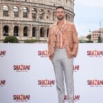Zachary Levi Instagram - When in Rome… as they say! 💃🏻🇮🇹 @parcocolosseo Grooming: @mnmachado Styled by: @warrenalfiebaker Lewk: @canali Shoes: @dukedexter Watch: @montblanc Photo: @warnerbrosentertainment Ministero della Cultura