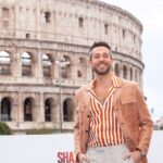 Zachary Levi Instagram - When in Rome… as they say! 💃🏻🇮🇹 @parcocolosseo Grooming: @mnmachado Styled by: @warrenalfiebaker Lewk: @canali Shoes: @dukedexter Watch: @montblanc Photo: @warnerbrosentertainment Ministero della Cultura