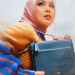 Zulin Aziz Instagram - #AIGNER Isa crossbody bag - my ultimate accessory companion. Rekaan moden, boleh digayakan dalam dua stail, leather strap untuk gaya kasual, stainless steel acara sosial. Love it! Explore and shop the Isa crossbody bag at AIGNER Pavilion KL | Suria KLCC | LaLaport BBCC @themeliumgroup #melium