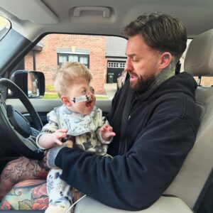 Aaron Chalmers Instagram - Cuddles with my little man ❤️ look at that beautiful little smile 😍