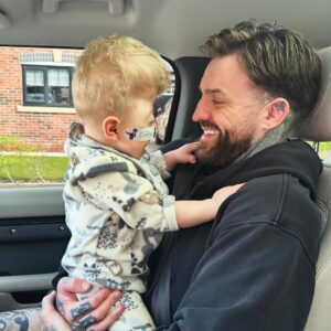 Aaron Chalmers Instagram - Cuddles with my little man ❤️ look at that beautiful little smile 😍