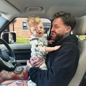 Aaron Chalmers Instagram - Cuddles with my little man ❤️ look at that beautiful little smile 😍