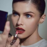 Alexandra Daddario Instagram - Getting ready for vanity fair… Lip glow oil is the perfect finishing touch to my make up look… ❤️ @diorbeauty @dior @diorbeautylovers
