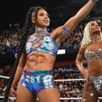 Bianca Crawford Instagram - Abs contoured with nothing but HARD WORK. … and genetics. We stay putting in werk over here! #ESTofWWE #wrESTleMania #Smackdown Gear: Made by ME